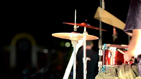 The guy plays the drums rhythmically Stock Footage 73908319