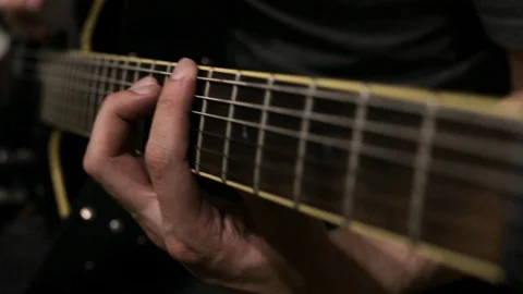 The guy plays the electric guitar Stock Footage 113348357