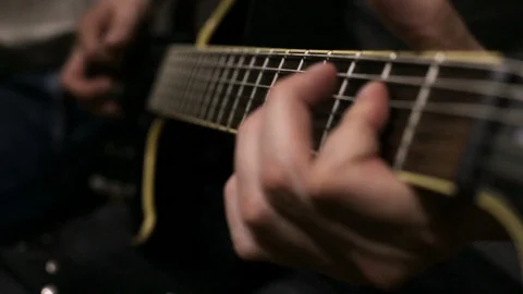 The guy plays the electric guitar Stock Footage 113348374