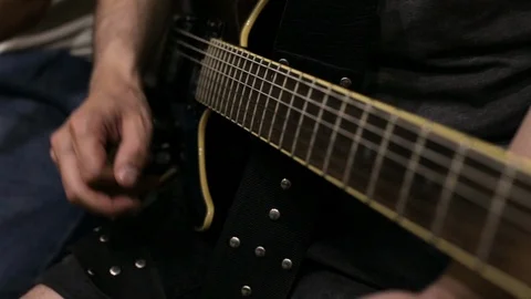 The guy plays the electric guitar Stock Footage 113348406