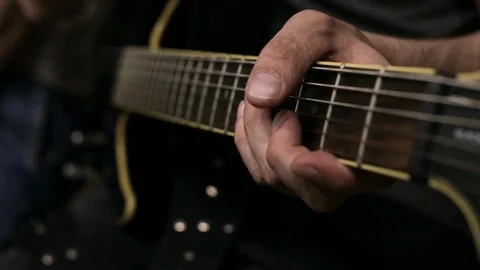 The guy plays the electric guitar Stock Footage 113348418