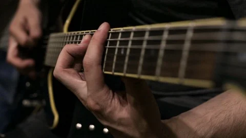 The guy plays the electric guitar Stock Footage 113348475