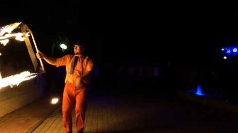 Guy plays with fire Stock Footage 95999970