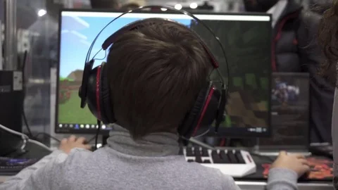 Guy plays a game in a computer club Stock Footage 82584067