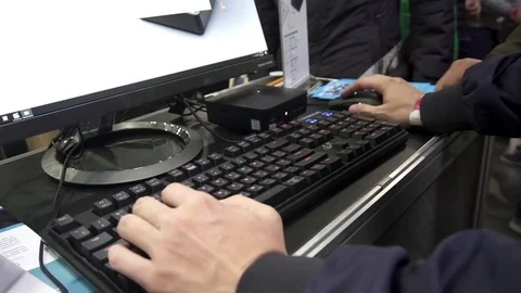 Guy plays a game in a computer club Stock Footage 82584089
