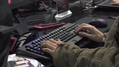 Guy plays a game in a computer club Stock Footage 82584182