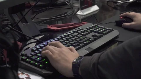 Guy plays a game in a computer club Stock Footage 82584226