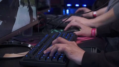 Guy plays a game in a computer club Stock Footage 82584383