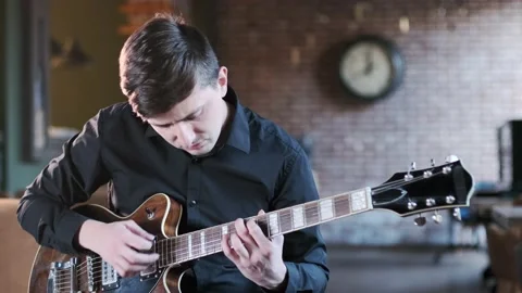 Guy plays the guitar in bar. Blues musical improvisation. Jazz, Blues, Funk Stock Footage 135355559