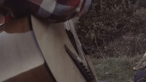 Guy plays guitar Stock Footage 97278042