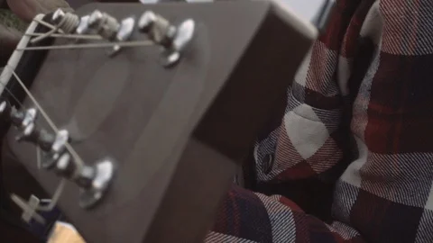 Guy plays guitar Stock Footage 97278049