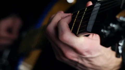 The guy plays guitar Stock Footage 99435125