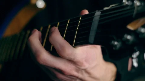 The guy plays guitar Stock Footage 99629344