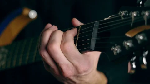 The guy plays guitar Video stock 100013022