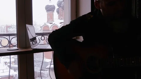 The guy plays the guitar. Stock Footage 102885037