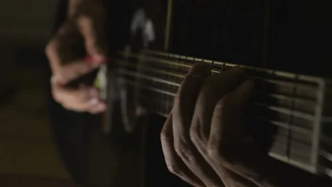The guy plays the guitar Stock Footage 138840533