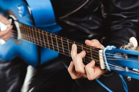 The guy plays guitar Photos