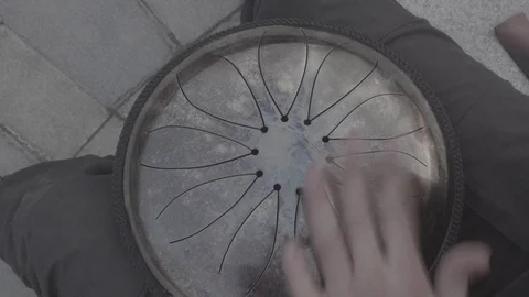 Guy plays on hapi drum detailed Video stock 89081801