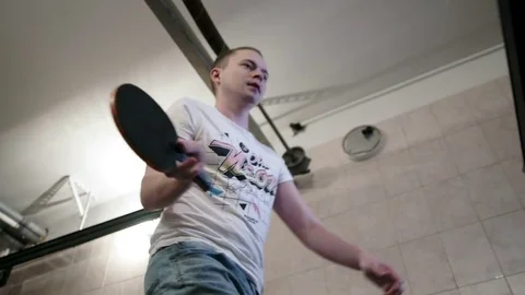 Guy plays ping pong and loses Stock Footage 81831701