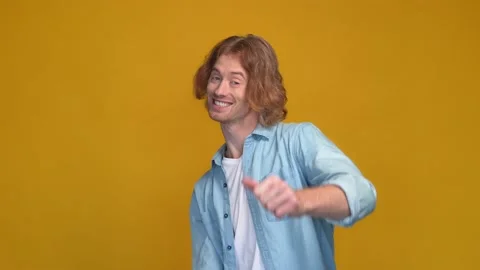 Guy point camera thumb-up enjoy great rate isolated bright color background Stock Footage 169277067