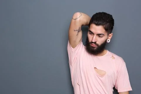 Guy posing with hand in hair Foto stock