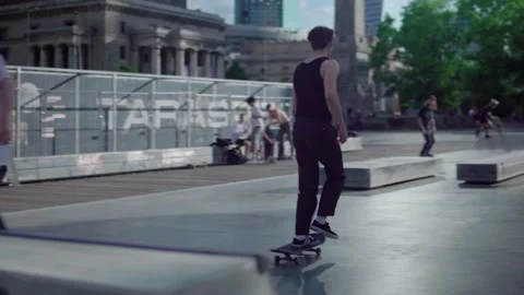 The guy is practicing a trick on the skateboard Stock Footage 156934402