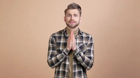 Guy pray hands wait appeal success isolated pastel color background Video stock 176800116