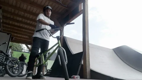 Guy prepares himself for competitions of cycling Video stock 103029860