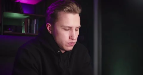 The guy is programming close-up Video stock 174726345