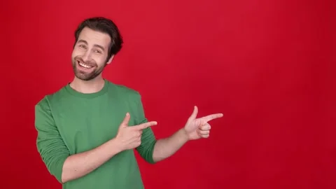 Guy promoter point empty space advert isolated bright color background Video stock 165750771