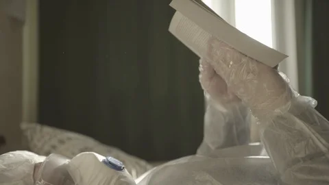 Guy in a protective suit escapes the virus Stock Footage 127354481