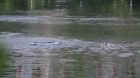 Guy Pulling Kayak Stock Footage 24999461