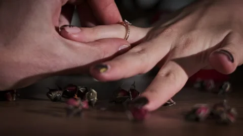 Guy Puts an Engagement Ring to His Bride Stock Footage 260481886