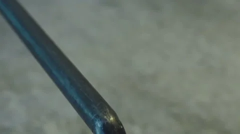 The guy puts on a pipe trick with telephone Stock Footage 60066022