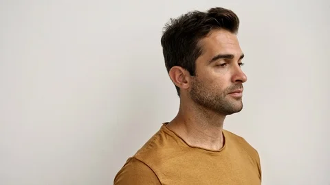 Guy putting on glasses Stock Footage 93275573