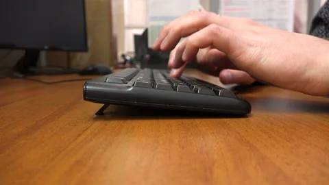 The guy quickly typing on the keyboard Stock Footage 111536295