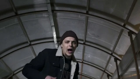 Guy reading rap and actively waving his arms Stock Footage 80476010