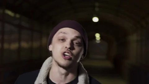 Guy reads rap and waves his hands Stock Footage 80480670