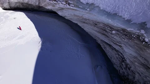 The guy in red goes epic to the frozen wall of ice Video stock 171176992