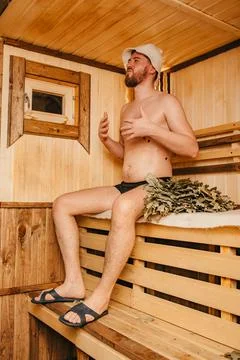 The guy is relaxing in the bath Stock Photos