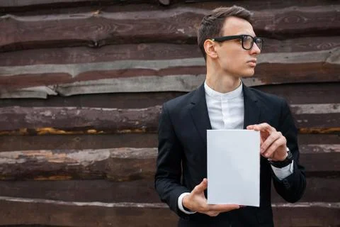 The guy represents or advertise something. Background with isolated place for Stock Photos