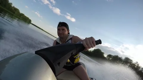 Guy ride on Jet Ski Stock Footage 65393161