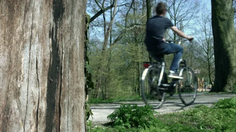 Guy rides a bike Stock Footage 49167623