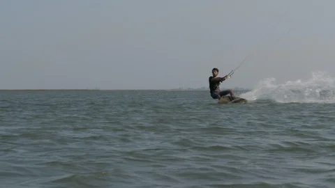 Guy rides board edge and practices Handle Pass close view Stock Footage 118992267