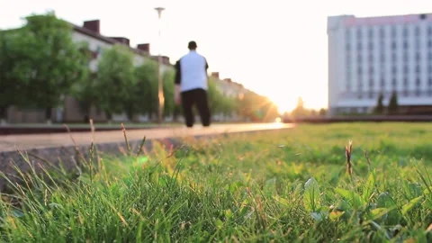 The guy rides on skates in the evening in the city Stock Footage 130736853