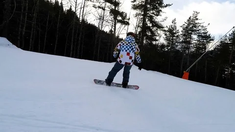 The guy rides on a snowboard Video stock 89003309