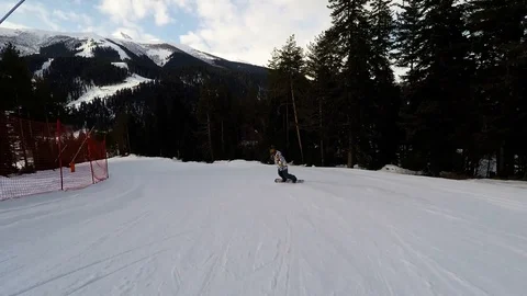 The guy rides on a snowboard Video stock 89003340