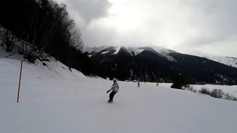 The guy rides on a snowboard Video stock 89003383