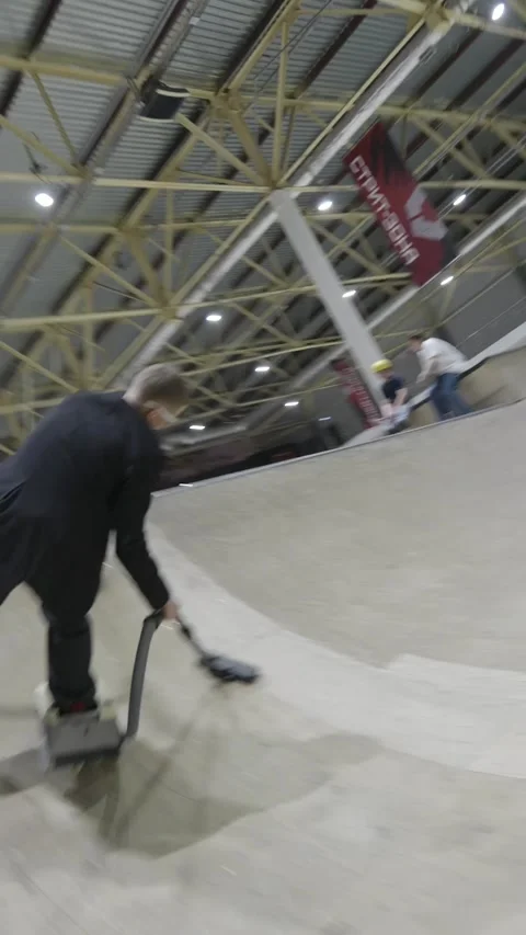 A Guy Rides Vacuum Roller Skates, Krasnoyarsk, Russia - 09 Apr 2025 Stock Footage 307869156