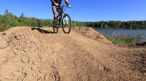 The guy riding bicycle on rough terrain 스톡 동영상 41769084